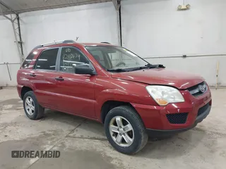 2009 Kia Sportage LX with VIN KNDJE723497555026, listed as a IAAI auction lot 42102679 with 136,398 mi miles. Bid and sale history available at carsss.com. Image 1.