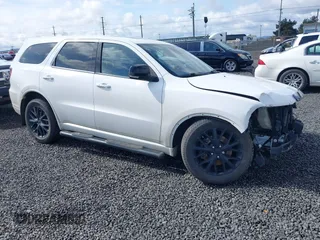 2016 Dodge Durango R/T with VIN 1C4SDJCT3GC315487, listed as a IAAI auction lot 41939604 with 123,480 mi miles and . Bid and sale history available at DreamBid. Image 1.