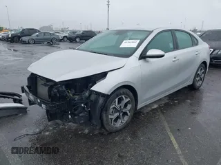 2021 Kia Forte LXS with VIN 3KPF24AD3ME268213, listed as a IAAI auction lot 41561861 with 22,544 mi miles and . Bid and sale history available at DreamBid. Image 2.