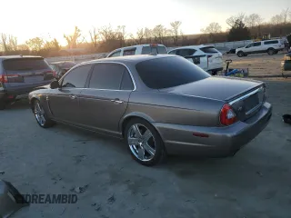 2008 Jaguar XJ Vanden Plas with VIN SAJWA82B18SH28807, listed as a Copart auction lot 42571155 with 97,548 mi miles and Salvage Title. Bid and sale history available at carsss.com. Image 2.