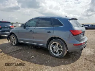 2014 Audi Q5 Premium Plus with VIN WA1LFAFP3EA013942, listed as a Copart auction lot 64371595 with 92,648 mi miles and Salvage title. Bid and sale history available at DreamBid. Image 2.