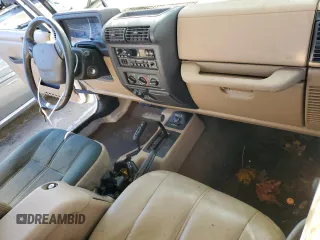 2002 Jeep Wrangler Sahara with VIN 1J4FA59S42P707938, listed as a Copart auction lot 81139774 with 168,338 mi miles and Salvage Title. Bid and sale history available at carsss.com. Image 8.