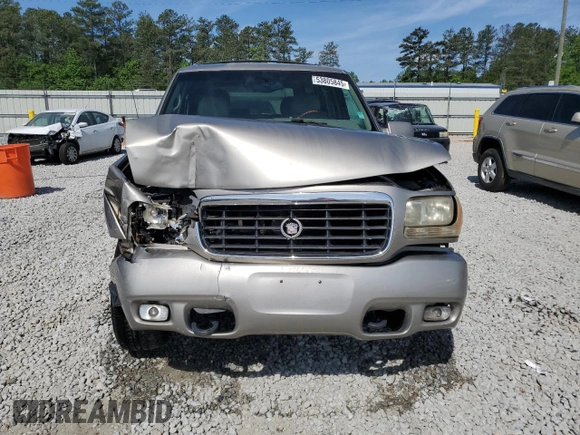 1999 Cadillac Escalade z VIN 1GYEK13RXXR408201, wystawiony jako Copart lot #53805845 z przebiegiem 268 205 mil mil oraz Szkoda całkowita • Salvage title. Historia ofert i sprzedaży dostępna na DreamBid. Obrazek 5.