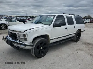 1999 GMC Suburban z VIN 3GKFK16R7XG510193, wystawiony jako Copart lot #80445474 z przebiegiem 182 251 mil mil oraz Szkody całkowita. Historia ofert i sprzedaży dostępna na DreamBid. Obrazek 1.