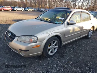 2003 Nissan Maxima SE z VIN JN1DA31D83T502519, wystawiony jako IAAI lot #41104746 z przebiegiem Nie podano mil oraz . Historia ofert i sprzedaży dostępna na DreamBid. Obrazek 2.