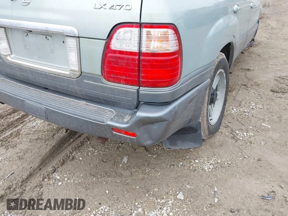 2004 Lexus LX 470 z VIN JTJHT00W143546192, wystawiony jako IAAI lot #41673810 z przebiegiem 232 196 mil mil oraz . Historia ofert i sprzedaży dostępna na DreamBid. Obrazek 19.