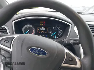 2016 Ford Fusion SE z VIN 3FA6P0H73GR144942, wystawiony jako IAAI lot #42770565 z przebiegiem 42 986 mil mil oraz . Historia ofert i sprzedaży dostępna na DreamBid. Obrazek 7.