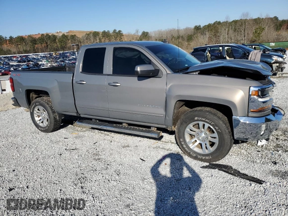 2017 Chevrolet Silverado 1500 LT with VIN 1GCVKREC4HZ222202, listed as a Copart auction lot 48537465 with 106,792 mi miles and Salvage Title. Bid and sale history available at DreamBid. Image 4.