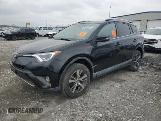 2016 Toyota RAV4 XLE with VIN 2T3RFREV9GW424040, listed as a Copart auction lot 52765855 with 129,594 mi miles and Salvage title. Bid and sale history available at DreamBid. Image 1.