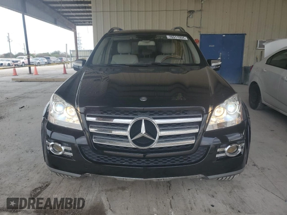 2009 Mercedes-Benz GL-Class 5.5L with VIN 4JGBF86E49A523923, listed as a Copart auction lot 76511554 with 184,489 mi miles and Salvage Title. Bid and sale history available at carsss.com. Image 5.