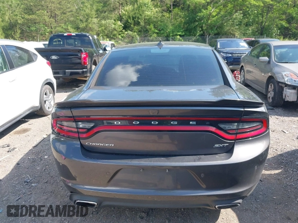 2018 Dodge Charger SXT Plus with VIN 2C3CDXHG9JH176400, listed as a IAAI auction lot 42128281 with 198,766 mi miles and . Bid and sale history available at carsss.com. Image 16.