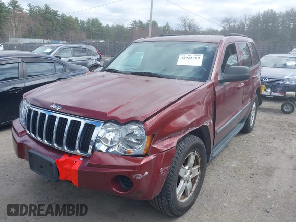 2007 Jeep Grand Cherokee Laredo with VIN 1J8GR48K27C518078, listed as a IAAI auction lot 42028460 with 121,530 mi miles. Bid and sale history available at carsss.com. Image 2.