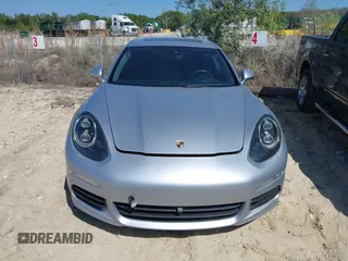 2014 Porsche Panamera S E-Hybrid with VIN WP0AD2A75EL044663, listed as a IAAI auction lot 41818381 with 44,194 mi miles and . Bid and sale history available at DreamBid. Image 12.