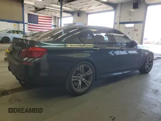 2013 BMW M5 z VIN WBSFV9C54DC773221, wystawiony jako Copart lot #54831865 z przebiegiem 127 949 mil mil oraz Tytuł czysty. Historia ofert i sprzedaży dostępna na DreamBid. Obrazek 3.