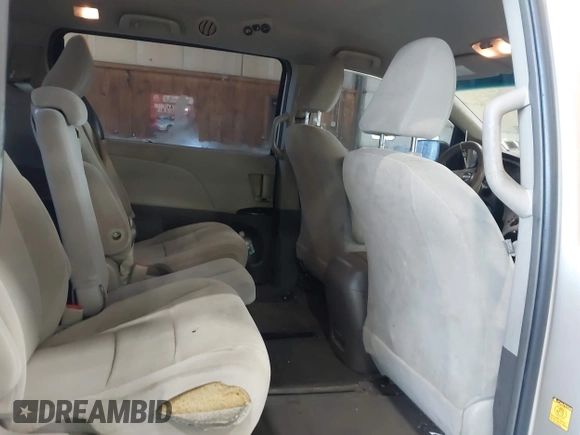 2012 Toyota Sienna with VIN 5TDZK3DC6CS258225, listed as a IAAI auction lot 42821817 with 377,789 mi miles and . Bid and sale history available at DreamBid. Image 8.