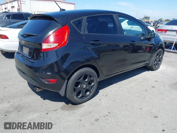 2011 Ford Fiesta SES with VIN 3FADP4FJ9BM181965, listed as a IAAI auction lot 42092140 with 150,304 mi miles. Bid and sale history available at carsss.com. Image 4.