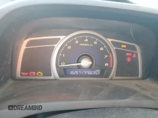2006 Honda Civic Cpe EX with VIN 2HGFG128X6H525359, listed as a Copart auction lot 67657284 with 162,571 mi miles and Salvage Title. Bid and sale history available at carsss.com. Image 9.