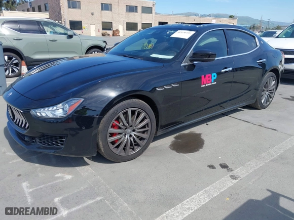 2019 Maserati Ghibli with VIN ZAM57XSA5K1328183, listed as a IAAI auction lot 41970101 with 61,260 mi miles. Bid and sale history available at carsss.com. Image 17.