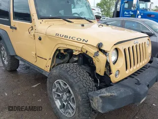 2014 Jeep Wrangler Rubicon with VIN 1C4BJWCG4EL145081, listed as a IAAI auction lot 42180723 with 113,659 mi miles and . Bid and sale history available at DreamBid. Image 17.