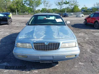 1997 Mercury Grand Marquis LS with VIN 2MELM75W7VX708034, listed as a IAAI auction lot 41878938 with 197,818 mi miles and . Bid and sale history available at DreamBid. Image 12.