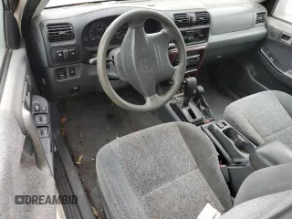 2002 Isuzu Rodeo S with VIN 4S2DM58W324327147, listed as a Copart auction lot 75194104 with Not Provided miles and Salvage Title. Bid and sale history available at DreamBid. Image 8.
