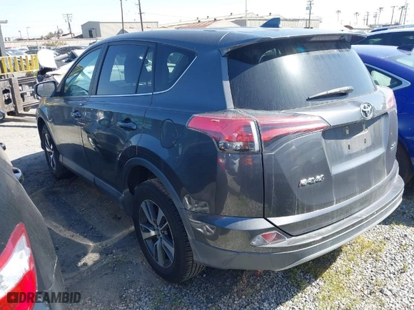 2018 Toyota RAV4 XLE with VIN 2T3WFREVXJW463701, listed as a IAAI auction lot 41599033 with 91,860 mi miles. Bid and sale history available at carsss.com. Image 3.