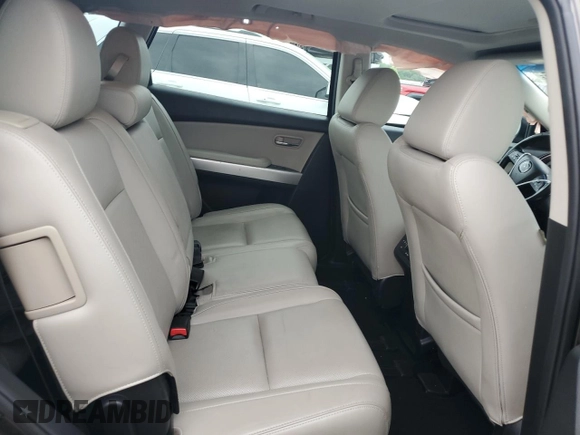 2015 Mazda CX-9 Grand Touring z VIN JM3TB2DA0F0468350, wystawiony jako Copart lot #61545095 z przebiegiem 154 050 mil mil oraz Szkoda całkowita • Salvage title. Historia ofert i sprzedaży dostępna na DreamBid. Obrazek 11.