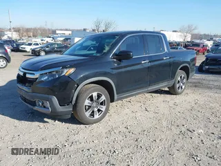 2019 Honda Ridgeline RTL-E with VIN 5FPYK3F7XKB033652, listed as a IAAI auction lot 41751421 with 96,774 mi miles and . Bid and sale history available at DreamBid. Image 16.