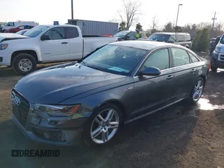 2014 Audi A6 Prestige with VIN WAUHGBFC8EN104920, listed as a IAAI auction lot 41827864 with 70,289 mi miles and . Bid and sale history available at DreamBid. Image 2.