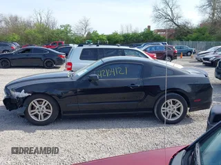2013 Ford Mustang V6 with VIN 1ZVBP8AM7D5203672, listed as a IAAI auction lot 42104121 with 215,815 mi miles. Bid and sale history available at carsss.com. Image 15.