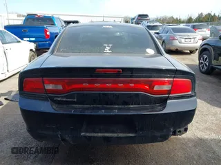 2014 Dodge Charger SE with VIN 2C3CDXBG8EH267589, listed as a IAAI auction lot 41793004 with 154,771 mi miles and . Bid and sale history available at DreamBid. Image 17.