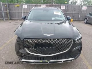 2025 Genesis GV70 2.5T with VIN KMUMADTB7SU199933, listed as a IAAI auction lot 42500513 with 15,384 mi miles and . Bid and sale history available at DreamBid. Image 12.