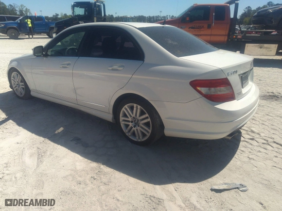2009 Mercedes-Benz C-Class 3.0L Sport with VIN WDDGF54X59R056788, listed as a IAAI auction lot 42050204 with 213,706 mi miles. Bid and sale history available at carsss.com. Image 3.