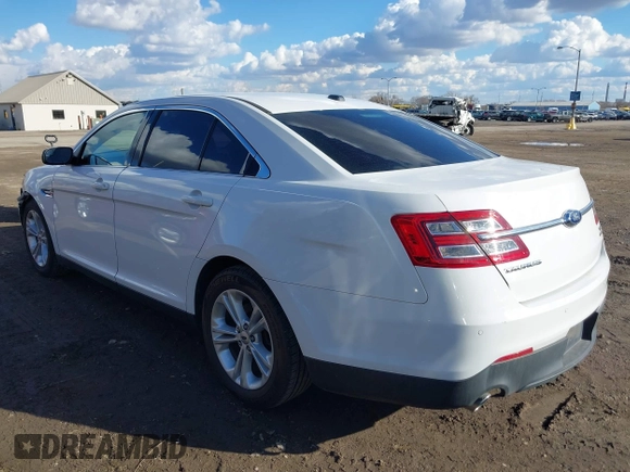 2014 Ford Taurus SEL with VIN 1FAHP2E88EG127074, listed as a IAAI auction lot 41688975 with 186,650 mi miles. Bid and sale history available at carsss.com. Image 3.