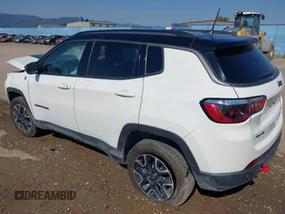 2021 Jeep Compass Trailhawk with VIN 3C4NJDDB0MT551172, listed as a IAAI auction lot 40155947 with 50,794 mi miles and . Bid and sale history available at DreamBid. Image 3.