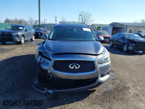 2016 Infiniti QX60 with VIN 5N1AL0MM5GC502404, listed as a IAAI auction lot 41347240 with 133,334 mi miles and . Bid and sale history available at DreamBid. Image 13.