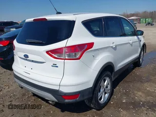 2013 Ford Escape SE with VIN 1FMCU9GX1DUD71994, listed as a IAAI auction lot 41748412 with 155,239 mi miles. Bid and sale history available at carsss.com. Image 4.