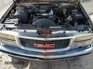 1999 GMC Suburban with VIN 3GKFK16R8XG531621, listed as a Copart auction lot 46593105 with 221,125 mi miles and Salvage Title. Bid and sale history available at carsss.com. Image 12.