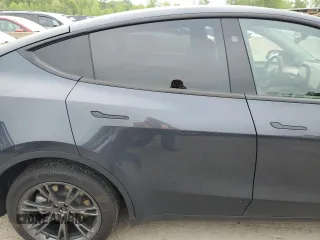 2024 Tesla Model Y Long Range с VIN 7SAYGDEE3RA328991, выставлен на аукционе Copart как лот 56637455 с пробегом Не указан миль и Списание • Salvage title. История ставок и продаж доступна на DreamBid. Изображение 11.