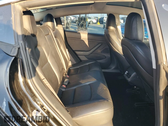 2019 Tesla Model 3 Mid Range z VIN 5YJ3E1EA8KF306096, wystawiony jako Copart lot #82712354 z przebiegiem 170 775 mil mil oraz Szkoda całkowita • Salvage title. Historia ofert i sprzedaży dostępna na DreamBid. Obrazek 11.