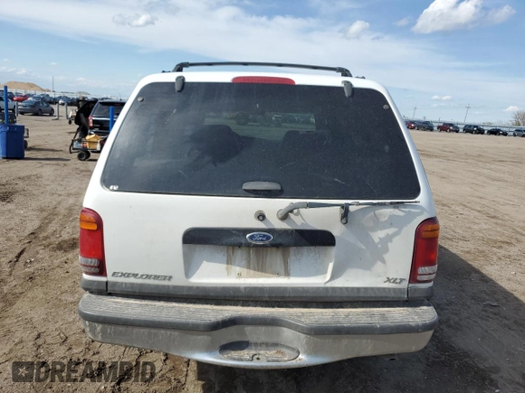 2000 Ford Explorer XLT with VIN 1FMZU83PXYZA71034, listed as a Copart auction lot 55447585 with 175,118 mi miles and Salvage title. Bid and sale history available at DreamBid. Image 6.