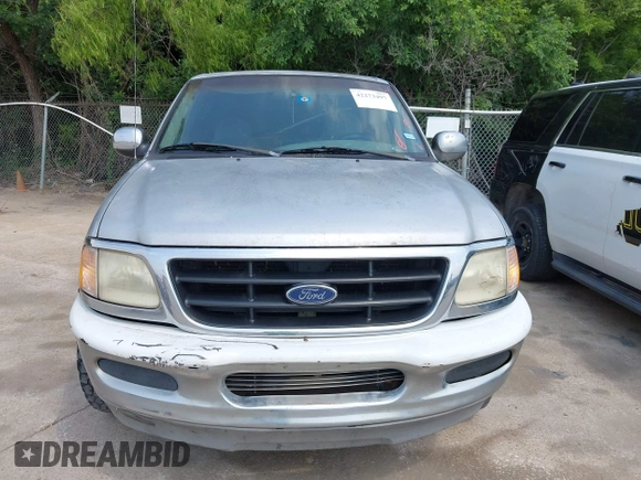 1999 Ford F-150 with VIN 1FTRX17W7XKB20640, listed as a IAAI auction lot 42273497 with 250,232 mi miles and . Bid and sale history available at DreamBid. Image 6.