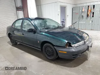 1998 Saturn SL z VIN 1G8ZH5280WZ312544, wystawiony jako Copart lot #50971665 z przebiegiem 119 855 mil mil oraz Szkoda całkowita • Salvage title. Historia ofert i sprzedaży dostępna na DreamBid. Obrazek 4.