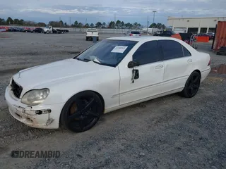 2003 Mercedes-Benz S-Class 4.3L with VIN WDBNG70J83A318268, listed as a IAAI auction lot 41380963 with 243,734 mi miles. Bid and sale history available at carsss.com. Image 2.