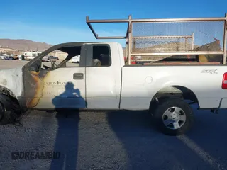 2007 Ford F-150 STX with VIN 1FTRX14W57KC44619, listed as a IAAI auction lot 41402821 with Not provided miles and . Bid and sale history available at DreamBid. Image 13.
