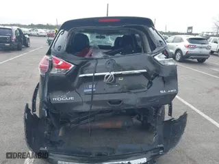 2016 Nissan Rogue SV with VIN 5N1AT2MV4GC877592, listed as a IAAI auction lot 41791451 with 84,385 mi miles. Bid and sale history available at carsss.com. Image 6.