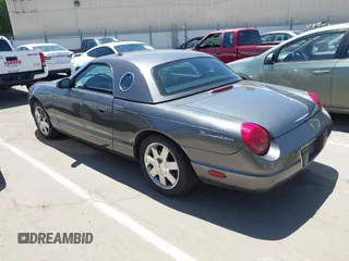 2003 Ford Thunderbird Deluxe z VIN 1FAHP60AX3Y109880, wystawiony jako IAAI lot #42336922 z przebiegiem 213 477 mil mil oraz . Historia ofert i sprzedaży dostępna na DreamBid. Obrazek 3.