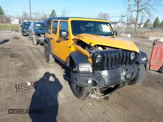 2021 Jeep Wrangler Unlimited Sport S with VIN 1C4HJXDN3MW650748, listed as a IAAI auction lot 41922627 with 75,159 mi miles and . Bid and sale history available at DreamBid. Image 1.