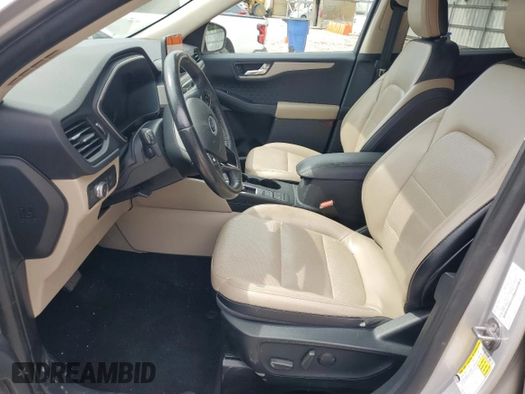 2020 Ford Escape SEL z VIN 1FMCU9H66LUB44403, wystawiony jako Copart lot #57934925 z przebiegiem Nie podano mil oraz Szkoda całkowita • Salvage title. Historia ofert i sprzedaży dostępna na DreamBid. Obrazek 7.