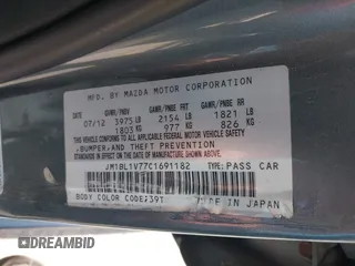 2012 Mazda 3 i Touring z VIN JM1BL1V77C1691182, wystawiony jako IAAI lot #42420310 z przebiegiem 73 099 mil mil oraz . Historia ofert i sprzedaży dostępna na DreamBid. Obrazek 9.